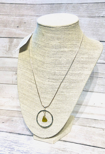 Hammered sterling circle necklace with genuine sea glass accent