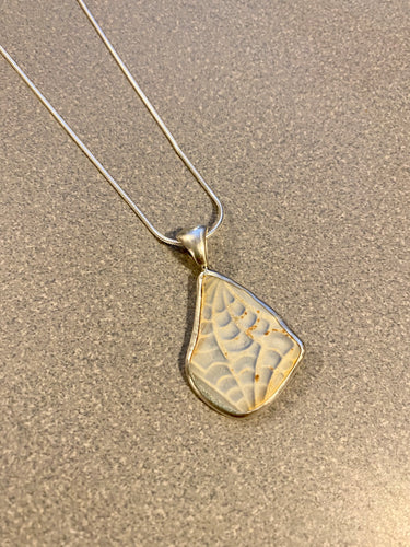 Unique sea pottery pendant