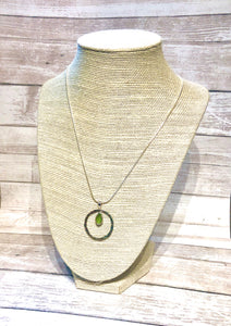 Hammered sterling circle necklace with genuine sea glass accent